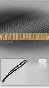 Detail view of high-density nylon tactical sling with metal hook and elastic buffer