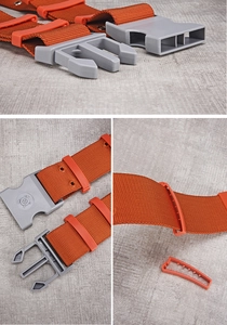 Detail of heavy-duty orange nylon belt with industrial quick-release buckle and reinforced holes