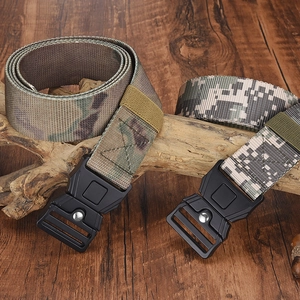 Close-up of tactical nylon belts with camouflage patterns and sturdy quick-release buckles