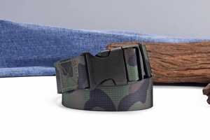 Detail of jungle camouflage nylon belt with black plastic quick-release buckle