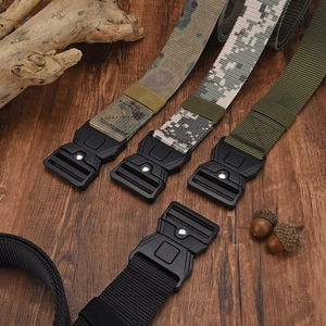 Close-up of tactical nylon belts in black and camouflage with quick-release buckle