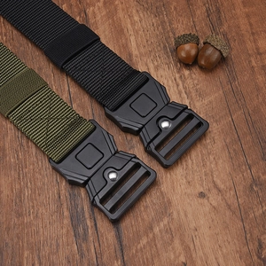 Detail of high-strength nylon tactical belts in black and army green with quick-release buckle