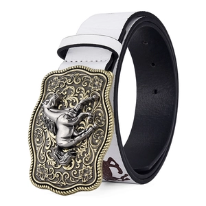 Detail of western cowboy belt with embossed galloping horse on antique bronze buckle