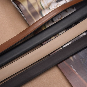 Slim reversible leather waist belts for women in multiple colors with fine texture