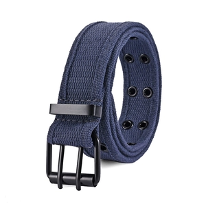 Close-up of navy blue canvas belt with matte black double-prong buckle and metal eyelets