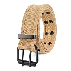 Close-up of khaki canvas belt featuring reinforced double metal eyelets and black pin buckle