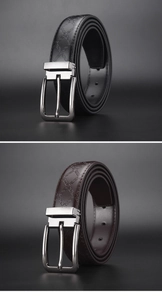 Detailed view of black and brown men's belts with embossed geometric Greek key patterns
