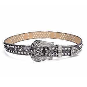Macro shot of high-end hip hop belt with silver rhinestones and skull buckle detail