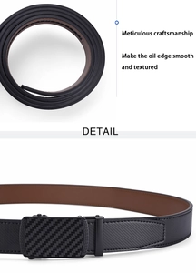 Detail of men's leather belt with black carbon fiber buckle and Greek pattern edge