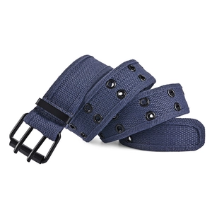 Close-up of dark blue canvas belt with double rows of black metal eyelets and double-prong buckle