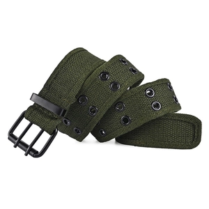 Detail of army green canvas belt featuring black metal double-prong buckle and metal eyelets