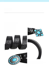 Detail of floral embossed black leather belt with turquoise stone set buckle in boho style