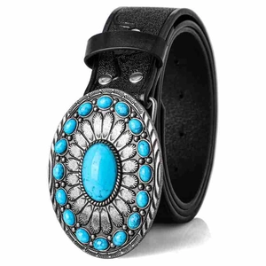 Detail of bohemian belt featuring embossed alloy buckle with inlaid turquoise stones