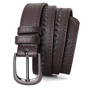 Detail view of dark brown leather belt with lychee texture and red-brown double stitching