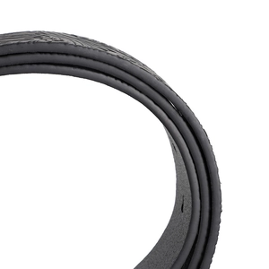 Macro view of black leather belt featuring embossed textures and durable layered structure