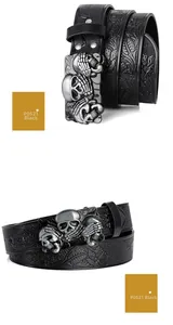 Detail of black leather belt featuring floral embossing and a vintage skull metal buckle