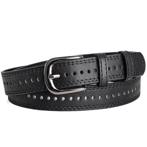Detail view of black textured leather belt with silver buckle and circular perforations