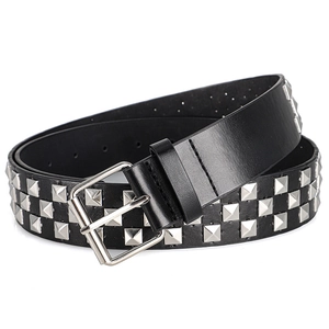 Detail of black Y2K punk belt with three rows of silver pyramid studs and metal buckle