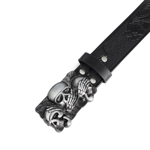Macro detail of gothic skull buckle with floral embossed black leather belt for men