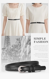 Détail d'une fine ceinture en cuir PU noir pour femme avec une boucle ardillon argentée mate