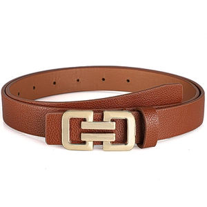 Minimalist brown leather belt for women with geometric gold buckle on white background