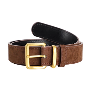 Detailed macro view of the brown suede belt featuring a golden square buckle and fine stitching