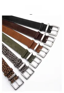 Detailed view of matte zinc alloy buckles and colorful suede leather belt collection