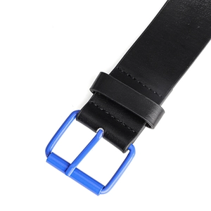 Macro shot of matte black leather belt with bright blue metal buckle and neat stitching