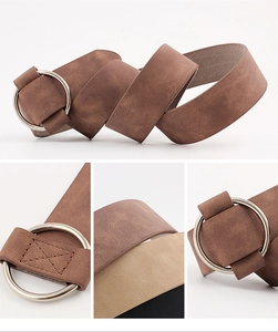 Detail view of double D-ring metal buckle and reinforced stitching on casual leather belts