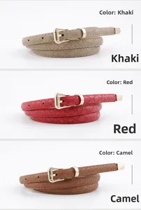 Détail de ceintures fines pour femmes en kaki, rouge et camel avec boucles dorées