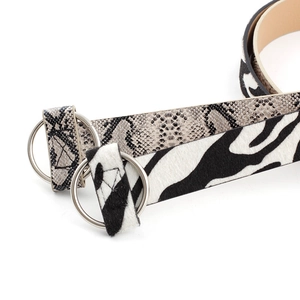 Women's minimalist round buckle wide belts featuring stylish snakeskin and zebra patterns