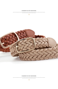Detail view of brown and beige braided belts with polished gold rectangular metal buckles