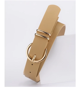 Detailed view of women's khaki PU leather belt with a polished gold round buckle