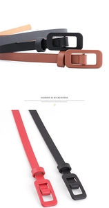 Detail showing colorful slim patent leather belts with matching square pin buckles