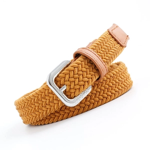 Gevlochten elastische riem in mosterdgeel met zilveren gesp en leren details