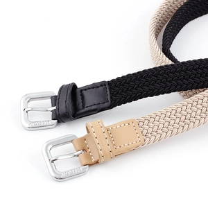 Gevlochten elastische riemen in zwart en beige met metalen gesp en lederen details