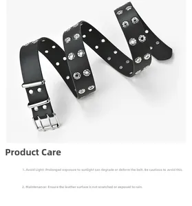 Détail d'une ceinture en cuir noir avec boucle à double ardillon argentée et œillets métal