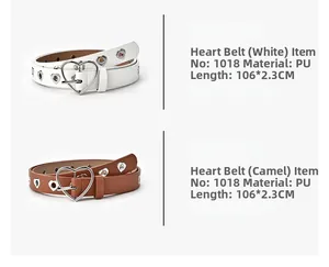 Détail de ceintures en PU blanc et camel avec des œillets métalliques en forme de cœur