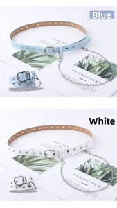 Detail of blue and white PU leather belts with heart buckles, metal eyelets and chains