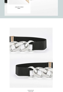 Detail of a black elastic waist belt with large silver chain and gold buckle accents