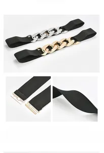Close-up of women's elastic belt showing gold and silver chain buckles and woven texture
