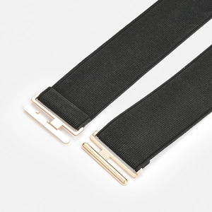 Elastic black waist belt with polished gold metal buckle for dresses and jeans decoration