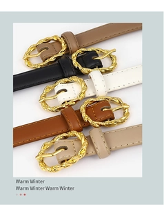 Détail de cinq ceintures fines en cuir avec boucles tressées dorées en divers coloris