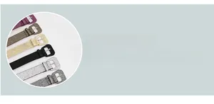 Detailed view of fashionable glitter belts with square buckles in multiple colors
