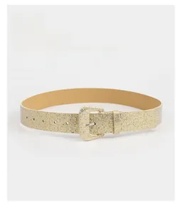 Macro shot of fashion gold glitter waist belt with sparkling texture and square pin buckle