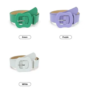 Three leather belts with apple-shaped buckles in green, purple, and white colors