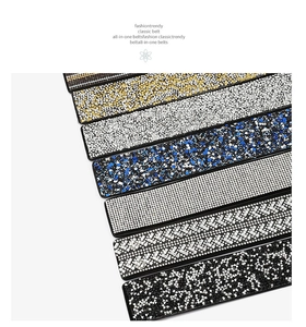 Detail view of sparkling rhinestone elastic waist belts showcasing various dazzling designs and colors for dresses.