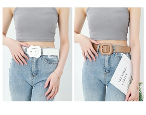 Detail showing white and brown wide belts with matte resin buckles on blue jeans
