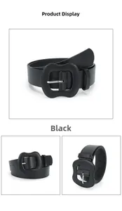 Detail of matte black leather belt with a wide fabric-wrapped square buckle for women