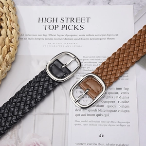 Elegant woven PU leather belts for women in black and brown with silver buckle detail